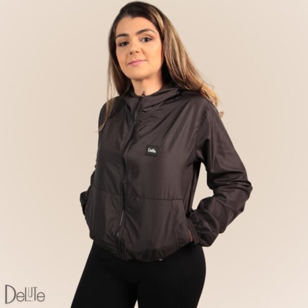 51BYuKXtKCL._AC_SL1200_.jpg Jaqueta Corta Vento Feminina Delute Lisa Sem Forro Com Capuz Resistente a Água e Ultra Leve